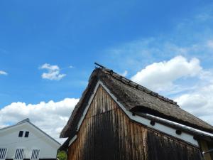 旧田中家住宅と青空の写真