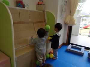 投げる