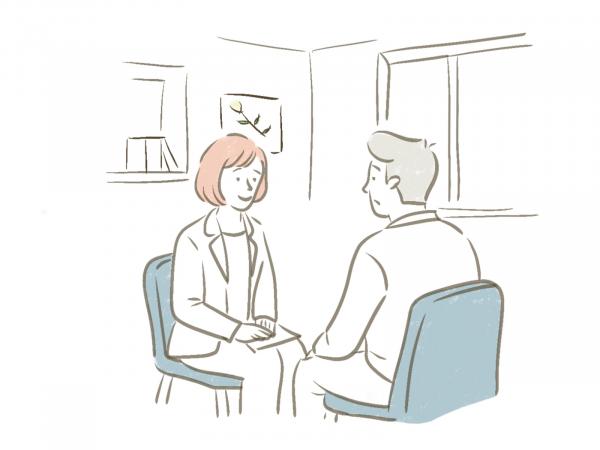 相談員と相談者が落ち着いて話をしているイラスト
